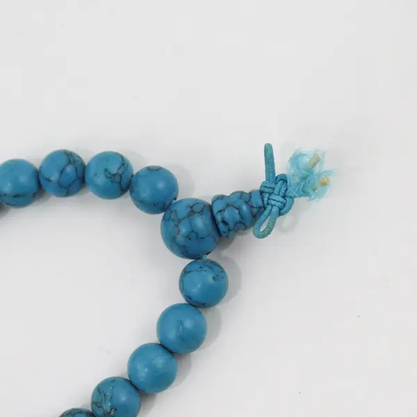 Turquoise Bead Stretch Bracelet Knotted Cord Pre-Owned