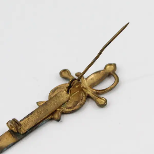 Broadcast NYC Vintage Sword Brooch Pin Tarnish Wear Missing Stone