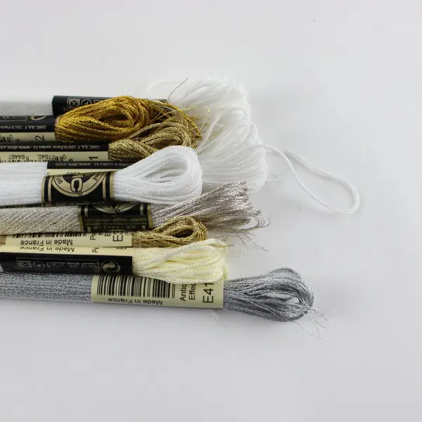 Lot of  11 DMC  Metallic Thread Skeins 8.7 yds white, cream, silver & gold, New 