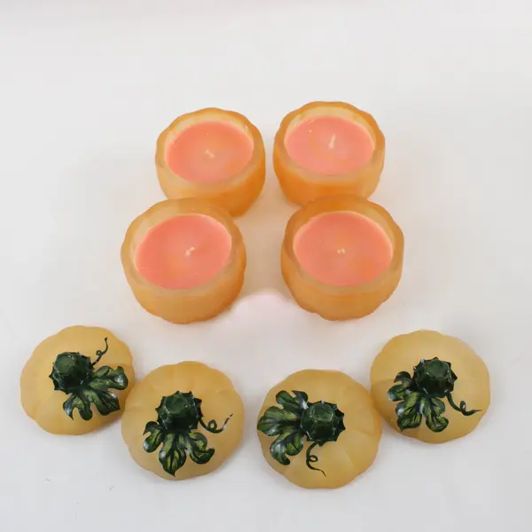 Celebrations Set of 4 Orange Pumpkin Votive Holders 2.5in w/ Used Pink Candles