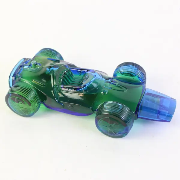 Avon Sure Winner Bracing Lotion Blue Green Glass Race Car Bottle 5.5 Fl Oz