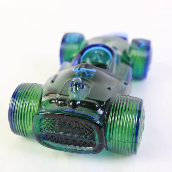 Avon Sure Winner Bracing Lotion Blue Green Glass Race Car Bottle 5.5 Fl Oz