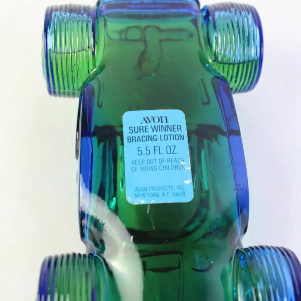 Avon Sure Winner Bracing Lotion Blue Green Glass Race Car Bottle 5.5 Fl Oz