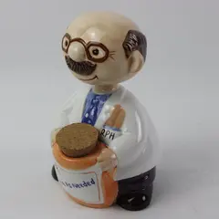 About Face Designs Pharmacist Take As Needed Ceramic Bobblehead Bank
