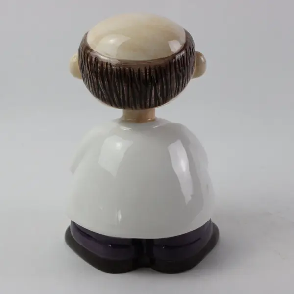 About Face Designs Pharmacist Take As Needed Ceramic Bobblehead Bank