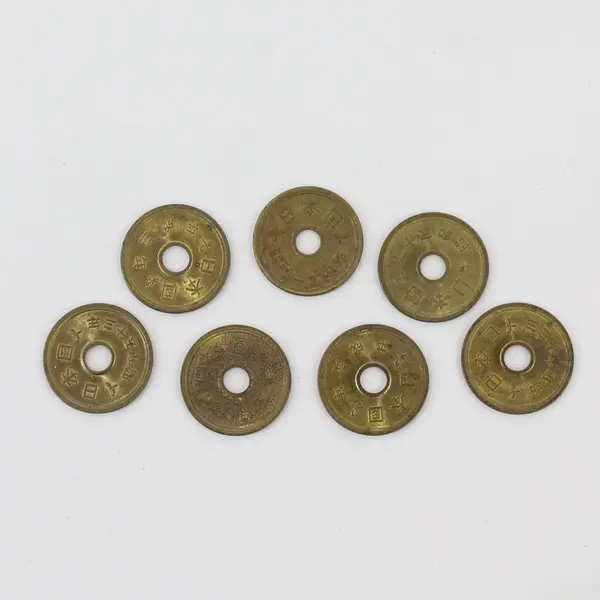 Lot of 7 Japanese 5 Yen Holed Coins Vintage Circulated