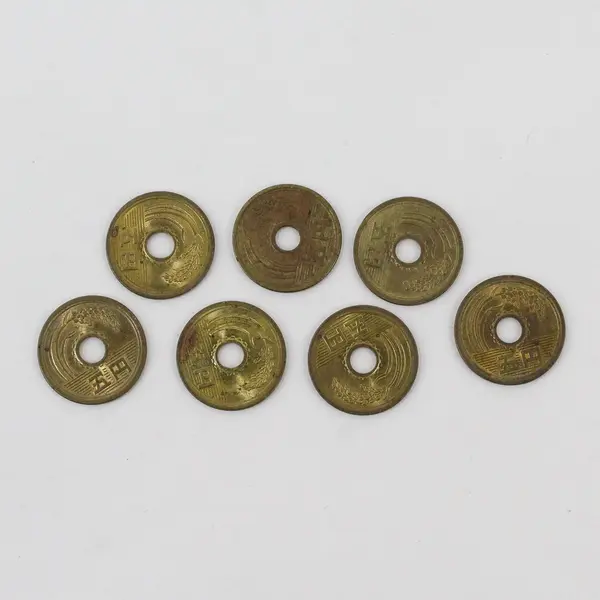 Lot of 7 Japanese 5 Yen Holed Coins Vintage Circulated