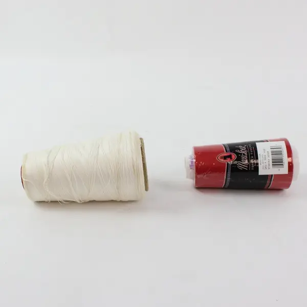 Lot of 2 Spools of Serger Thread, one is Maxi-Lock brand 3000 yds., Red & White 
