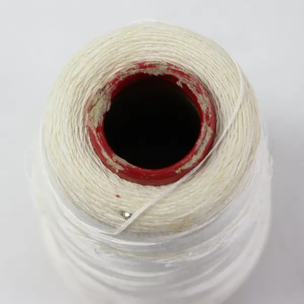 Lot of 2 Spools of Serger Thread, one is Maxi-Lock brand 3000 yds., Red & White 