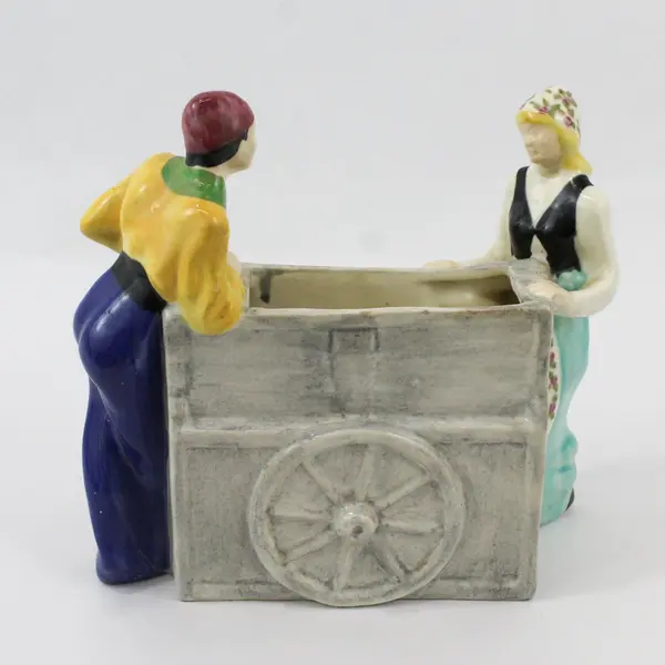 Brayton Laguna Pottery Couple Pushing And Pulling 2 Wheel Cart Planter
