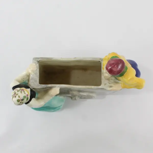 Brayton Laguna Pottery Couple Pushing And Pulling 2 Wheel Cart Planter