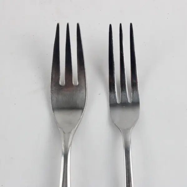 Set of 2 Mismatched Three-Pronged Stainless Steel Forks (Walco, Wesley Forge)