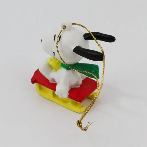 VTG Rubber United Feature Syndicate Peanuts Snoopy & Woodstock on Sled Ornament