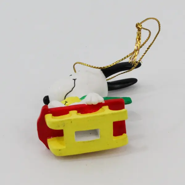 VTG Rubber United Feature Syndicate Peanuts Snoopy & Woodstock on Sled Ornament