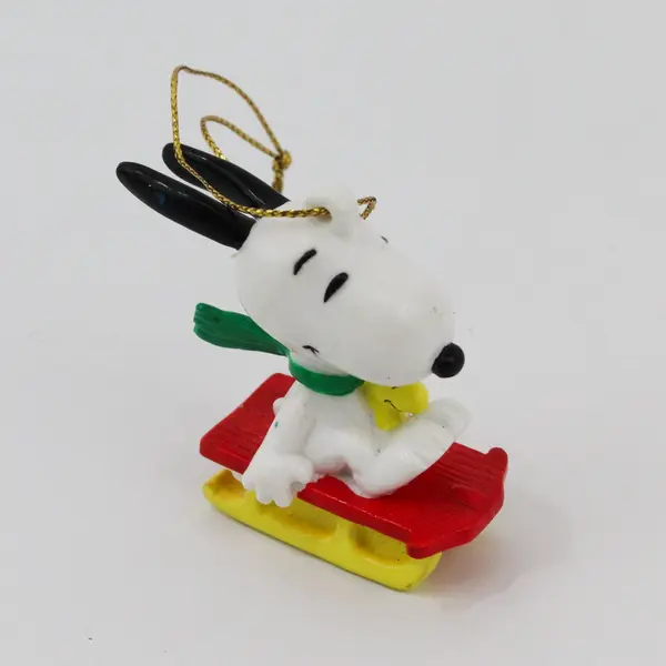 VTG Rubber United Feature Syndicate Peanuts Snoopy & Woodstock on Sled Ornament