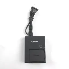Canon Battery Charger with Battery Included Untested