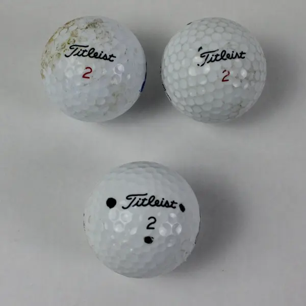 3 Mixed Brand Golf Balls Titleist Permanex Heddington Used Practice