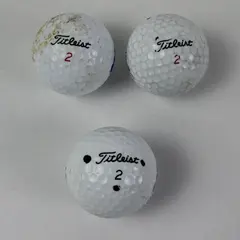 3 Mixed Brand Golf Balls Titleist Permanex Heddington Used Practice