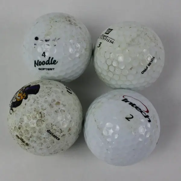 Lot of 4 Used Mixed Brand Golf Balls