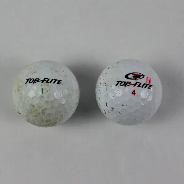 Lot of 2 Top-Flite Golf Balls Series 1 & Series 4