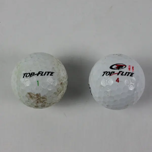 Lot of 2 Top-Flite Golf Balls Series 1 & Series 4