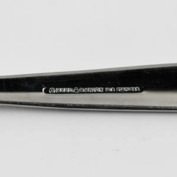 A Reed & Barton 18/8 Stainless Durham-Matte Pierced Serving Spoon 8.75 Inches