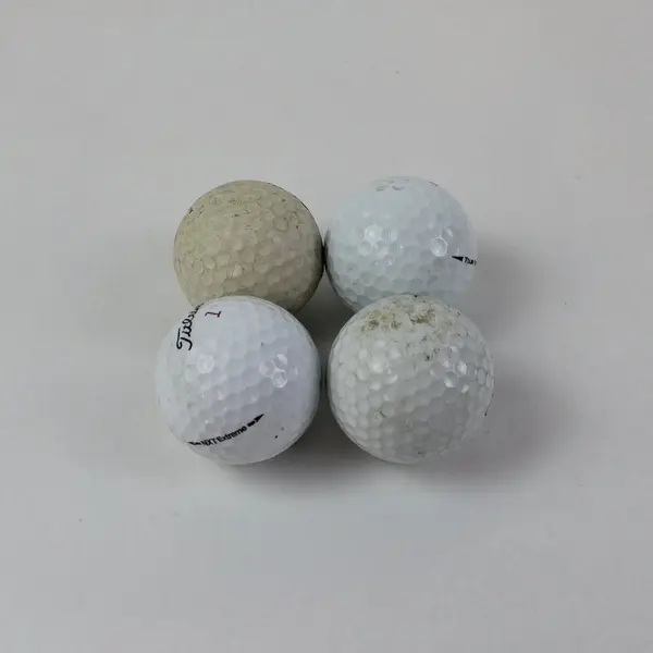 4 Used Titleist Golf Balls Practice Casual Play White