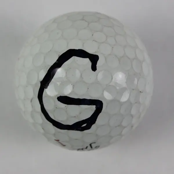 Lot of 4 Mixed Brand Used Golf Balls 3 White 1 Yellow Titleist Top-Flite