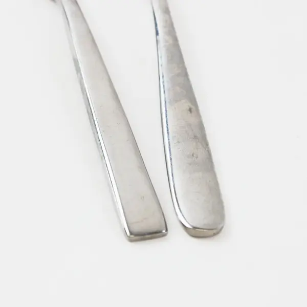 Lot of 2 Fortessa SS Serrated Spoon 6.5" and Teaspoon 6" Unknown Mixed Patterns