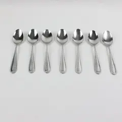 Lot of 7 Farberware Knot Pattern Spoons