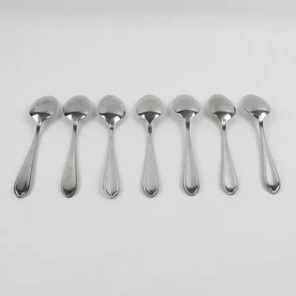 Lot of 7 Farberware Knot Pattern Spoons