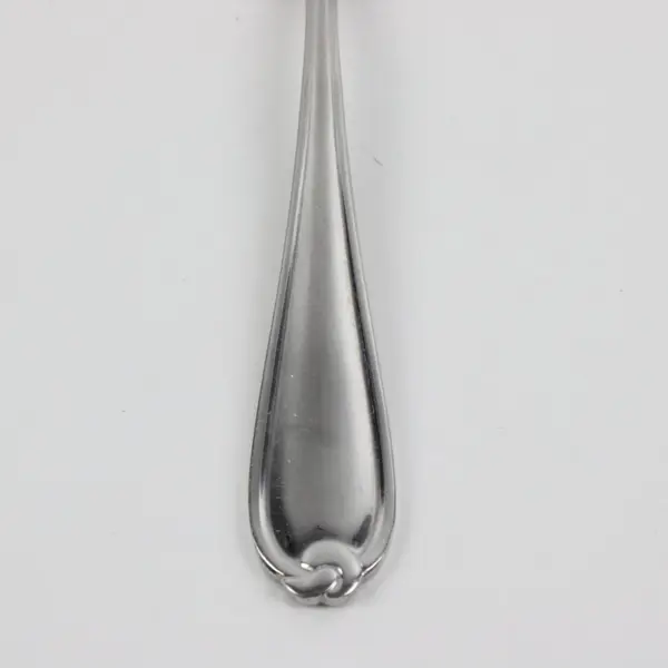 Lot of 7 Farberware Knot Pattern Spoons