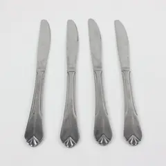 Lot of 4 Farberware Bevel Bay 8.5" Butter Knives Used