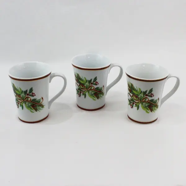 Set of 3 Harry & David Ceramic Holiday Mugs Ribbons Cones Mistletoe