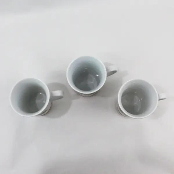 Set of 3 Harry & David Ceramic Holiday Mugs Ribbons Cones Mistletoe