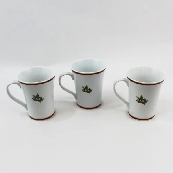 Set of 3 Harry & David Ceramic Holiday Mugs Ribbons Cones Mistletoe