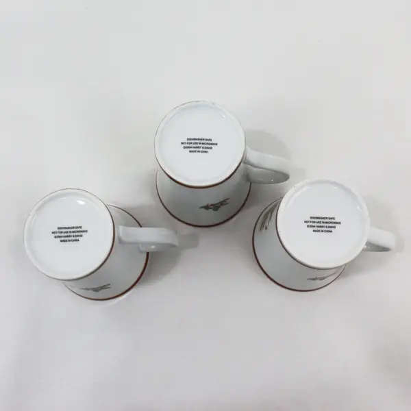 Set of 3 Harry & David Ceramic Holiday Mugs Ribbons Cones Mistletoe