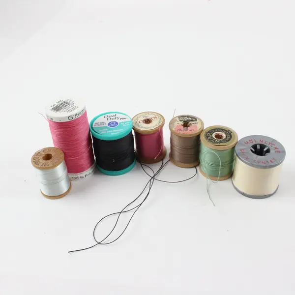 Lot of 7 Assorted Sewing Thread Spools Gutermann Coats Talon Dual Duty Plus