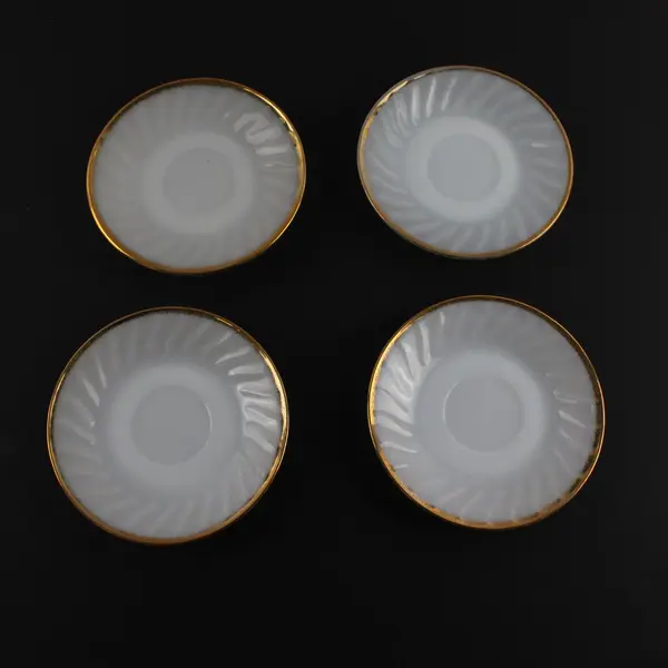 Four Fire King Ware 5 Saucers