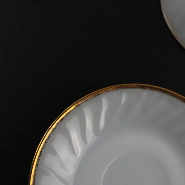 Four Fire King Ware 5 Saucers