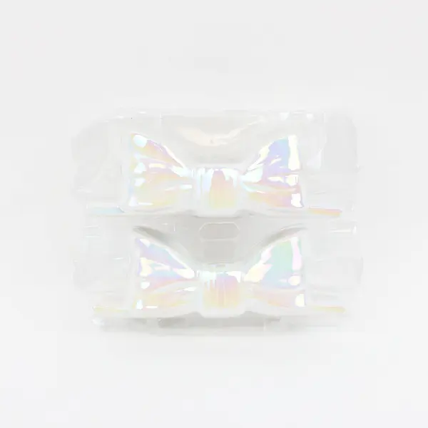 Set of 2 Ankyo Development Opalescent Ceramic Bow Tie Taper Candle Holders