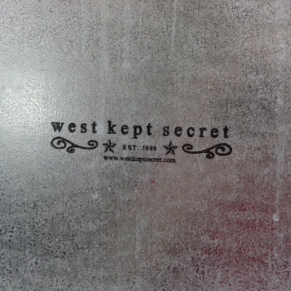 West Kept Secret Distressed Metal Scrollwork Hanging Wall Plaque