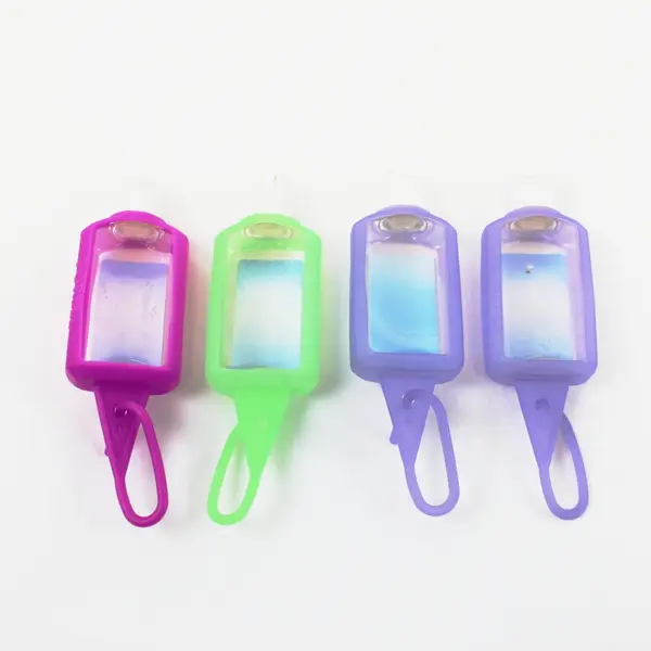 Lot of 7 Plastic Travel-Size Squeeze Bottles Clear and Opaque, 4 Keychains