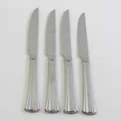 A Set of 4 Reed & Barton Brookshire Stainless Solid Handle Steak Knives 9.75 In