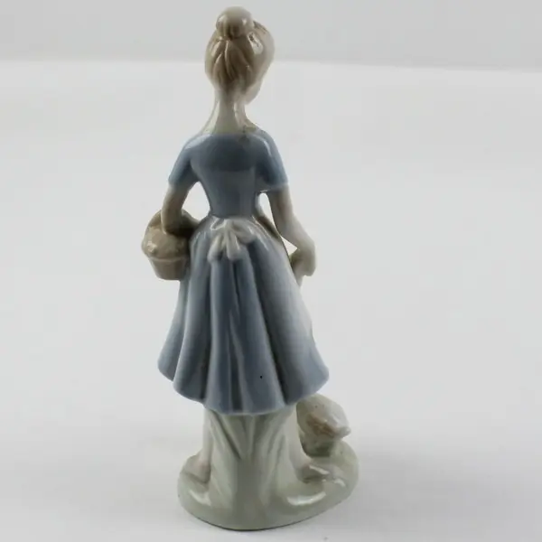 Porcelain Girl with Basket and Ducks Blue Dress Figurine Decorative Statue