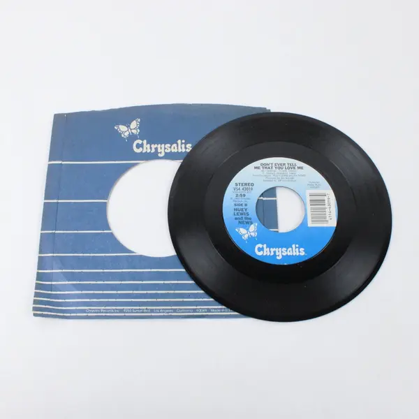 Huey Lewis & The News  7" Stuck With You / Don't Ever Tell Me That You Love Me