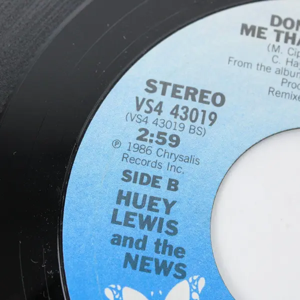 Huey Lewis & The News  7" Stuck With You / Don't Ever Tell Me That You Love Me
