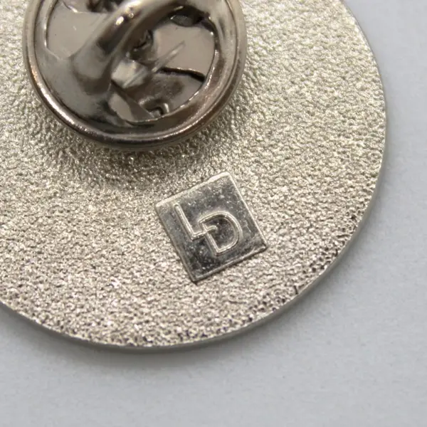 Sam Jackson Guild OHSU Round Raised Lapel Pin 1 Inch Silver