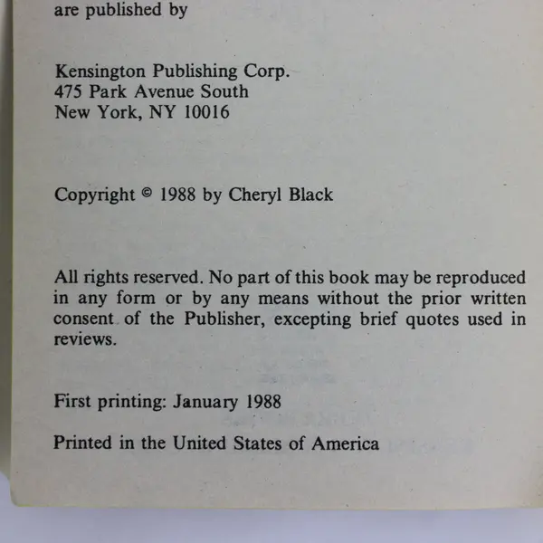 Lot 2 PB Comanche Caress by Cheryl Black; Daughter of the Reef by Clare Coleman