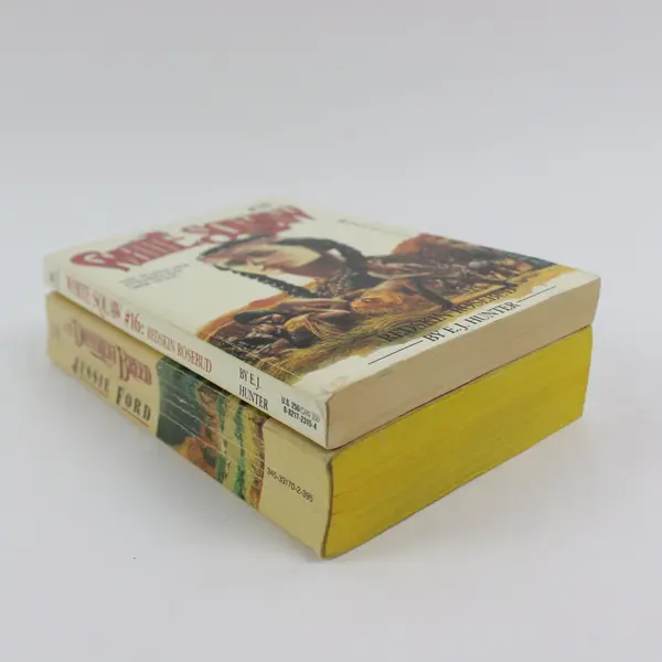 Lot of 2 Paperback Books Good Pre-Owned Condition